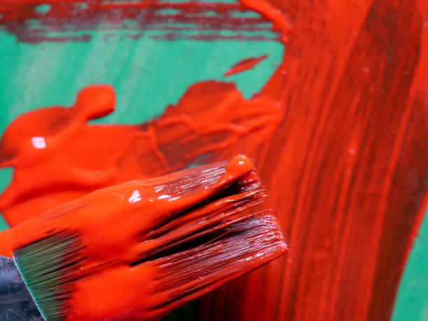 istock close-up used brushes and paint 2190971917