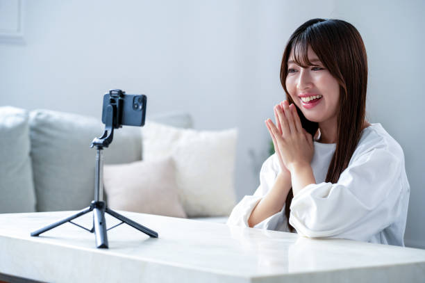 istock A Japanese woman taking a video 2190973190