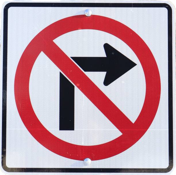 istock A square white signn with red circle and an arrow. 2190973617