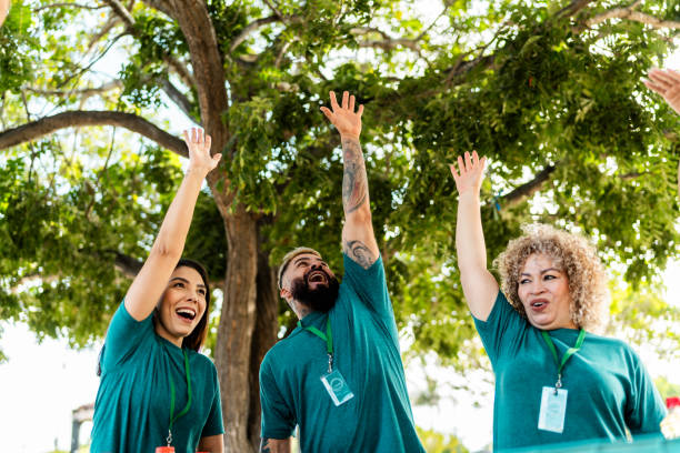 istock Volunteers celebrating outdoors 2190974285
