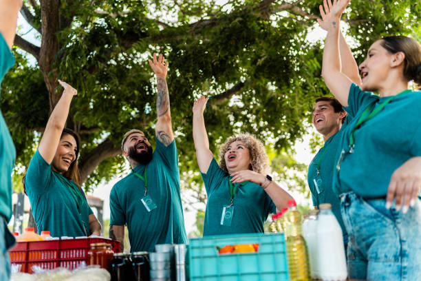 istock Volunteers celebrating outdoors 2190974289