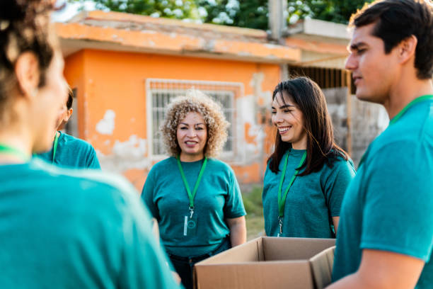 istock Volunteers talking outdoors 2190974929
