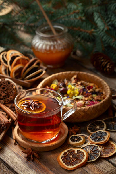 istock Christmas herbal tea with ingredients on a old wooden table. 2190977432