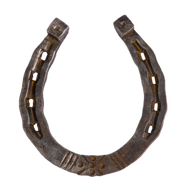 Old rusty horseshoe isolated on white background. Clipping path included.