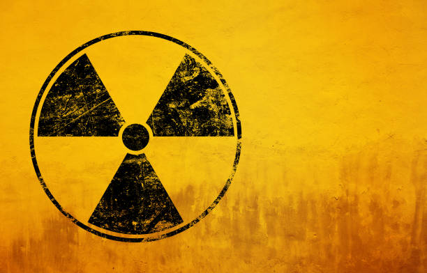 istock Radioactive symbol indicating high danger on yellow background 2190979322