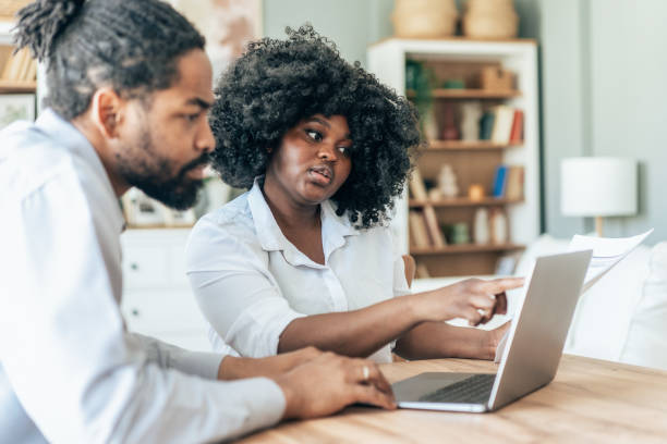 istock Couple doing their budget at home 2190980374
