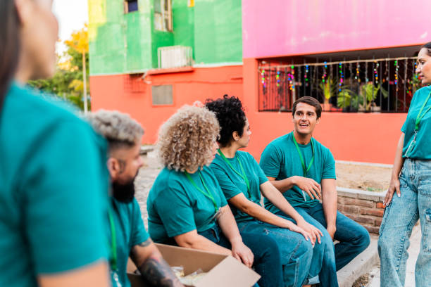 istock Volunteers talking outdoors 2190984234