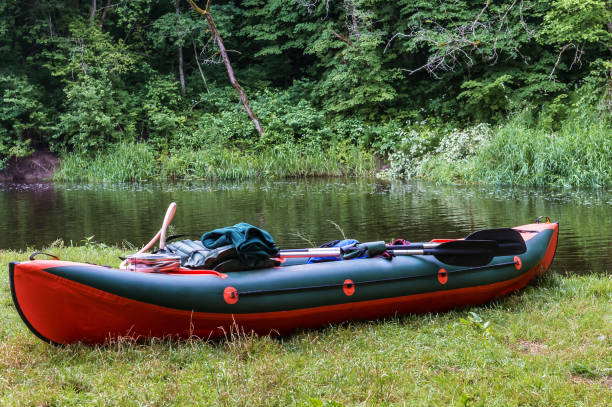 Rafting in kayaks. Active recreation on the water. Canoeing trip on the river. Selective focus