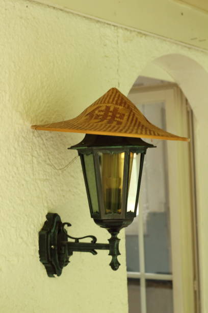 istock Cultural Glow Chinese Hat on a Lamp 2190987171