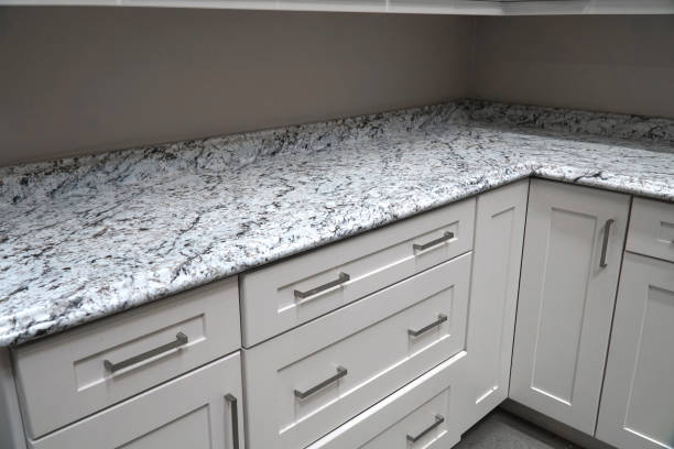 istock close up on kitchen countertop and wood cabinet 2190987745