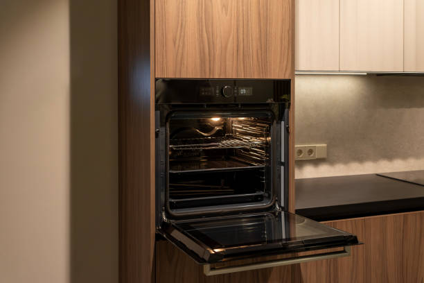 istock Modern built-in oven with open door, ready for cooking and baking 2190987923