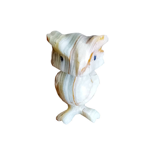 Ceramic figurine of a bird isolated on a white background