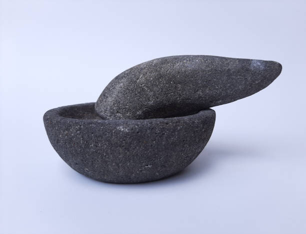 istock Stone mortar and pestle, isolated on white background 2190997490