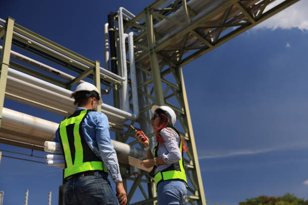 istock female and male piping system engineers working  at the pipeline construction in the refinery or chemical plant at an industrial estate 2191007627