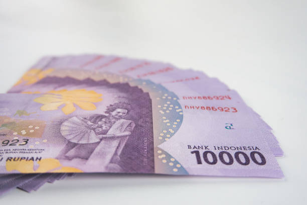 istock Indonesian Rupiah Banknotes Arranged in an Artistic Display on White Background 2191020203