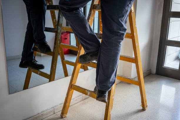istock male painter is climbing wooden stair horizontal fixxer upper still 2191021493