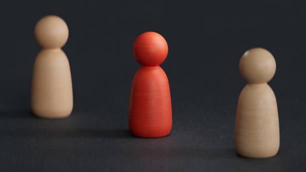 istock Different person in a crowd. Unique individuality concept.Perfect for representing business strategy, leadership, and management.3D rendering on black background. 2191023821