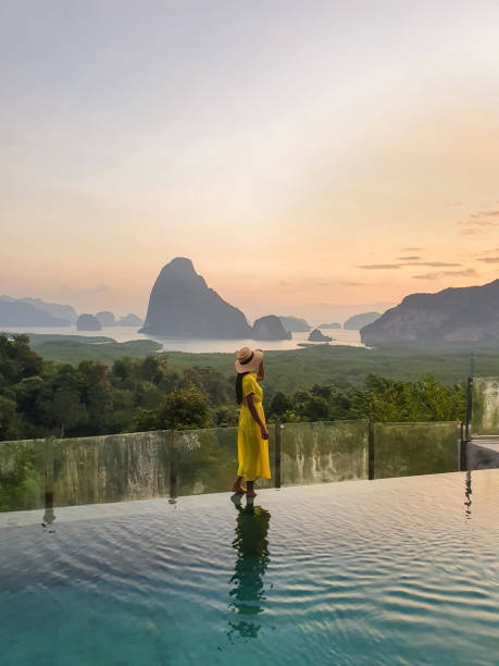 istock Tranquil evening by the infinity pool in southern Thailand, with stunning mountain views 2191024170