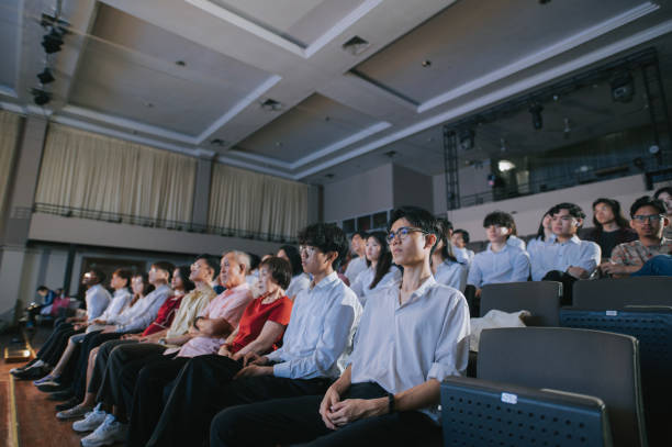 istock Asian Audience watching performance at auditorium 2191026960