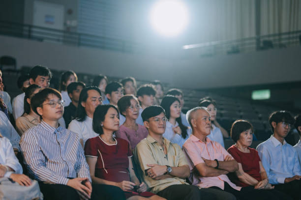 istock Asian Audience watching performance at auditorium 2191026993