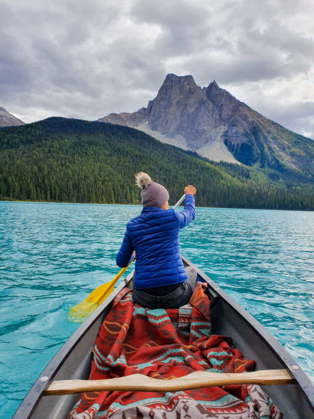 istock Paddling through crystal waters with mountains in the backdrop Emerald Lake Yoho National Park 2191027644