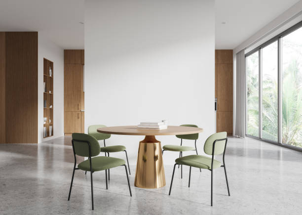 istock Modern dining area with green chairs and round table in contemporary interior design, large windows and wooden accents in bright apartment. 3D Rendering 2191028174