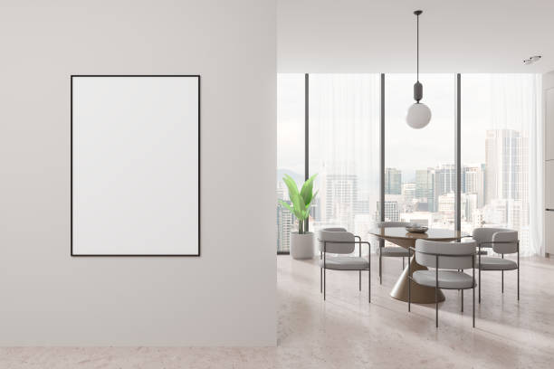 istock Blank framed poster on wall in modern dining room with city view and minimalist decor. 3D Rendering 2191028362
