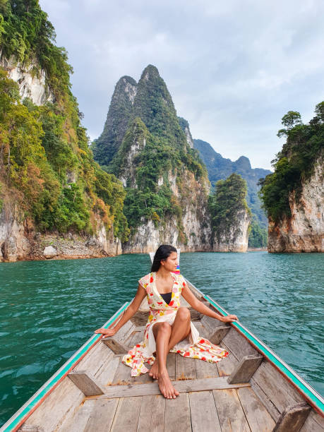 istock A serene journey through emerald waters with majestic limestone cliffs in a tropical paradise 2191028414