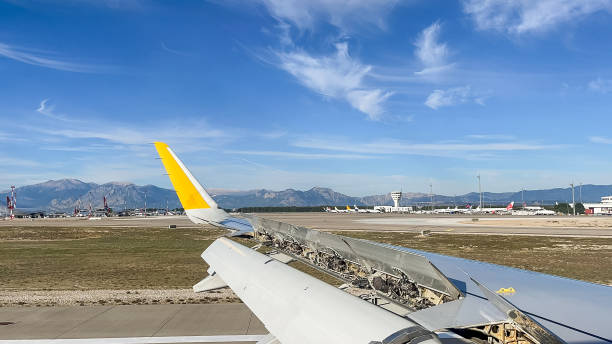 istock Mountain Views from the Plane. Airport Runway Scene 2191028755