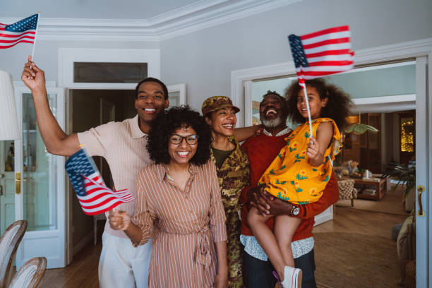 istock Us Veteran woman homecoming 2191030711