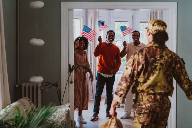 istock Us Veteran woman homecoming 2191031102