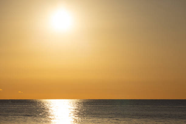 istock Golden Sunset Reflecting on the Ocean Horizon 2191034914