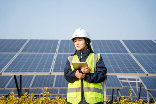 istock Asian female engineer using digital tablet in solar power station 2191035566