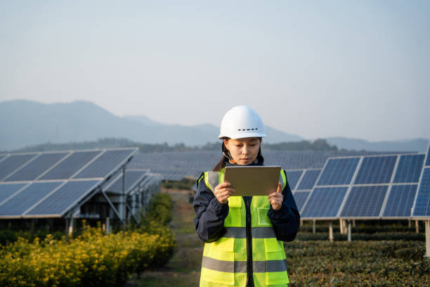 istock Asian female engineer working with digital tablet in solar power 2191035854