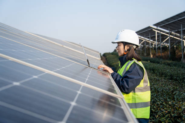 istock Asian female engineer working on laptop in solar power station 2191036186