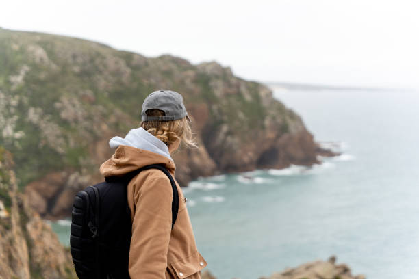 istock Traveler woman contemplating the panoramic views from the cliffs. 2191036720