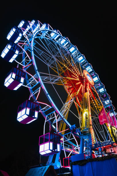 istock Illuminated Ferris Wheel at a Christmas Market 2191037608