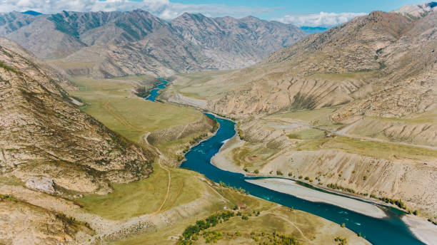 istock Katun river flowing through mountain valley in altai, russia 2191038801