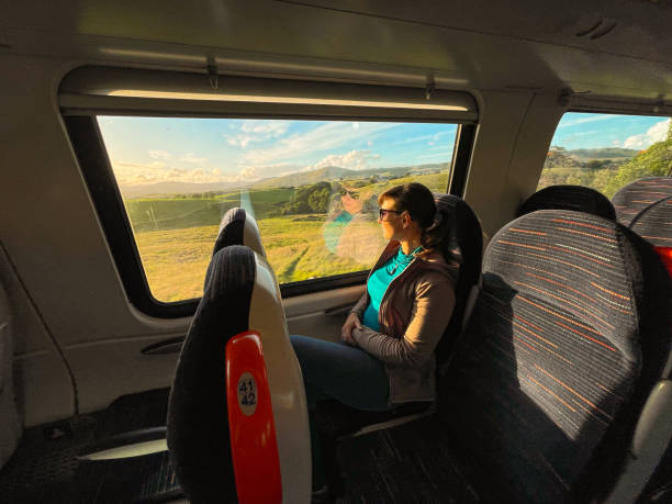 istock Female passenger on a train ride from work back home at the end of working day 2191039021