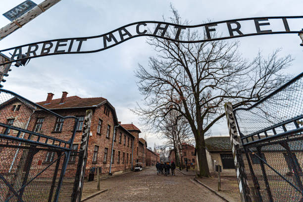 Auschwitz, Poland - December 3, 2018: This image captures the infamous entrance gate of Auschwitz I, bearing the words 