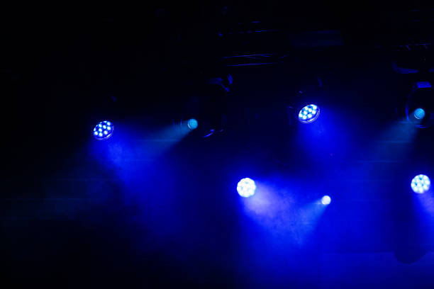istock Blue spotlights at a concert hall.. 2191045100