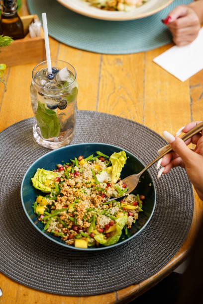 istock Quinoa salad with fresh vegetables and a refreshing drink 2191046098