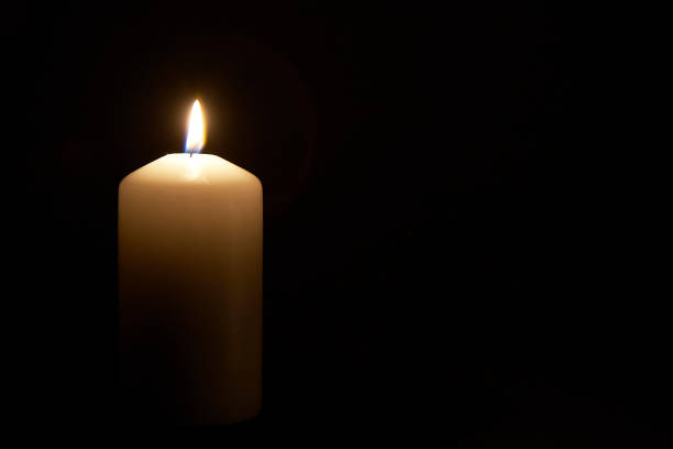 istock candle, candles, black background, death, grief, loss 2191048712