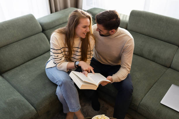 istock Happy couple relaxing at home 2191052284