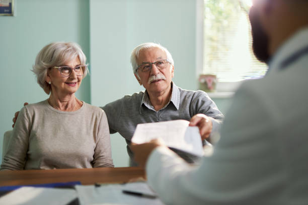 istock Senior couple visit doctor 2191054416