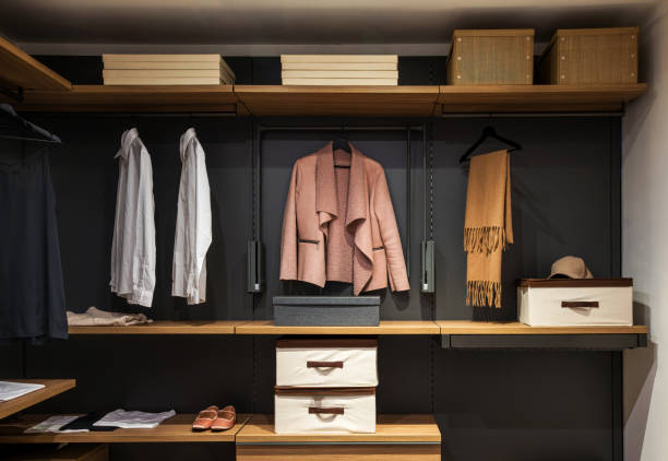 istock Modern walk in closet displaying stylish clothes and accessories, offering elegant organization 2191054513