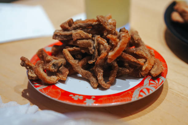 istock crispy fried salmon skin on plate 2191058939