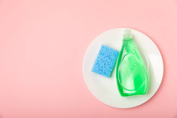 istock Colorful dish sponges on textured background. Kitchen sponge. Cleaning concept, cleaning service. Dishwashing liquid with clean and dirty dishes plate. Place for text, copy space. Wash the dishes. 2191060966