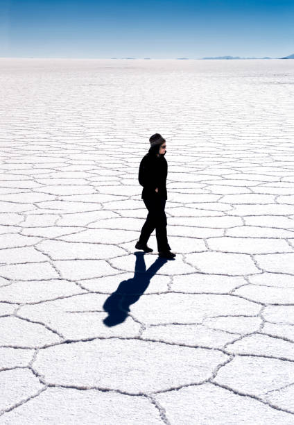 istock Walking across salt flats in Bolivia 2191062066