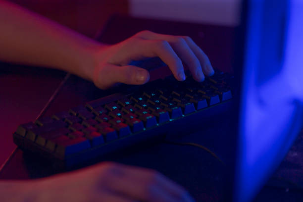 istock A person is actively typing on a keyboard located in front of a laptop computer 2191063895